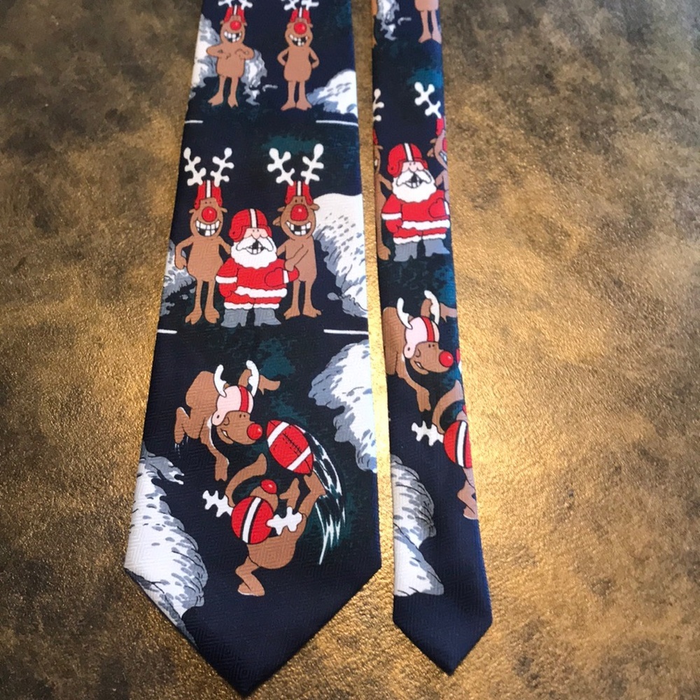 Santa & Reindeer playing football in the snow Navy blue christmas novelty tie